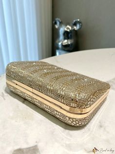 Bird in Bag - Elegant Evening Clutch Bag featuring Sparkling Rhinestones and Opulent Golden Metal Chain Strap, Perfect for Sophisticated Parties, Weddings, and Formal Affairs Glamorous Rhinestone Clutch For Formal Events, Glamorous Rhinestones Evening Bag For Formal Occasions, Chic Wedding Clutch With Rhinestones, Glamorous Rhinestone Formal Clutch, Chic Crystal Evening Bag For Weddings, Gold Sparkling Evening Bag For Party, Glamorous Sparkling Clutch For Weddings, Elegant Event Clutch With Bling, Elegant Clutch With Bling For Events