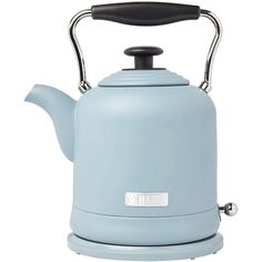 a blue tea kettle sitting on top of a white table next to a black handle