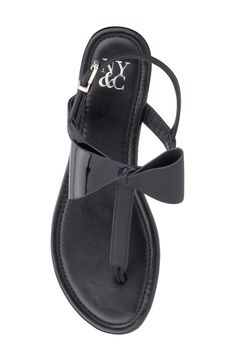 A slim-soled slide sandal is secured with an ankle strap and features a mixed metallic bow to ensure eye-catching appeal. Adjustable strap with buckle closure  Synthetic upper and lining, rubber sole Imported New York And Company, Sandal Women, Thong Sandals, Things To Buy, Slide Sandals, Nordstrom Rack, Ankle Strap, Rubber Sole, Womens Sandals