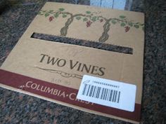 two wines are in the box on the counter