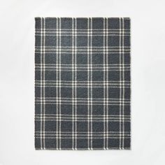 a black and white checkered cloth on a white surface