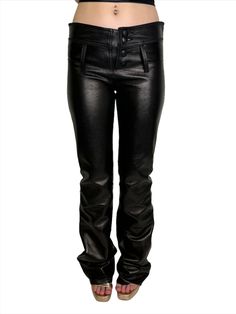 Drooling over these sexy lambskin Y2K pants! These beauty's are constructed in the softest leather with a panel at the knee, double waistline with leather button fly, boot flare, and a back peekaboo. The low waist is totally Xtina in the Dirty music video. Material: lamb leather Product Measurements: See the Measurement Guide in the photo carousel. Waist: 25" Bum: 32" Entire Length: 43" Inseam: 33" Low Rise: 9.25" Condition: AB. See the Condition Grade Scale. Damage to consider: See images. Care Fitted Leather Jeans For Fall, Fitted Straight Leg Leather Pants With Belt Loops, Fitted Wide Leg Leather Jeans, Fitted Leather Pants With Standard Cut Leg, Fitted Leather Straight Leg Pants, Fitted Leather Wide Leg Jeans, Fitted Leather Jeans For Night Out, Fitted Leather Pants Standard Cut, Fitted Wide Leg Leather Pants