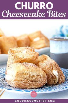 there is a blue and white plate that has some food on it with the words churro cheesecake bites