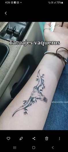 a person with a tattoo on their arm and the words tattoos vaqueros written in spanish