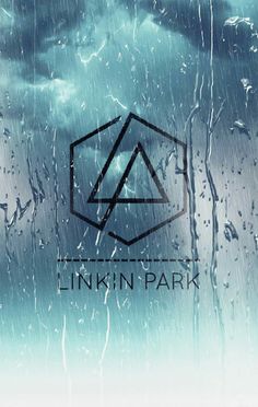 the linkin park logo is seen through rain