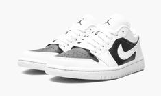 The Women’s Air Jordan 1 Low “Panda” is a timeless look for the women’s sizing of Michael Jordan’s first signature shoe arranged in a two-tone white-and-black color scheme.  Whether or not pandas were the actual inspiration for the design, the aptly named “Panda” does indeed draw from the large bear’s white-and-black coat.  Specifically, black leather graces the perforated toe and mid-panel.  The rest of the shoe, including the forefoot, eyelets, collar, heel, and Swoosh, are cast in a supple wh Womens Air Jordan 1, Womens Air Jordan, Panda Shoes, Jordan 1 Low White, Wmns Air Jordan 1, Jordan Ones, Nike Air Jordan 1 Low, All Nike Shoes, Jordan 11 Retro Low