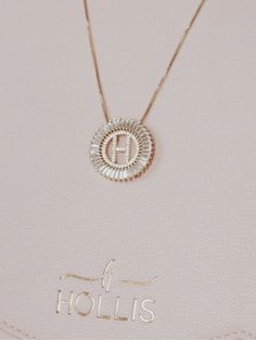 Glam Initial Necklace! The letter of your choice surrounded by a circle of baguette stones. A staple piece in your jewelry collection that’s sure to be a show stopper! Copper Pearl, Travel Wear, A Circle, Here Comes The Bride, Staple Pieces, Egift Card, Initial Necklace, Hair Jewelry, Wedge Shoes