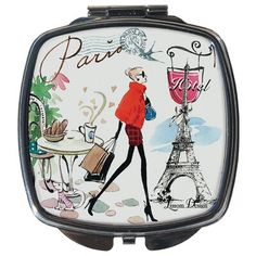 a compact purse with a painting of a woman in paris