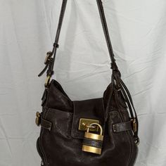 Chloe Vintage Material: Leather Made In Italy Color: Brown Height: 12" Inches Wight: 14" Inches Depth: 5" Inches (Adjustable) Please Contact Us For Any Questions Chloe Brown, Locks & Key, Chloe Bag, Large Shoulder Bags, Vintage Brown, Brown Gold, Calf Leather, Chloe, Bag Lady