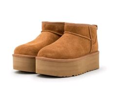 Step into cozy and stylish comfort with our UGG Ultra Boots Inspired Antelope! 🦌❄️ 🎁 Looking for the perfect Christmas gift for her? Look no further! Our UGG-inspired boots are a fantastic present that will have her smiling from ear to ear. Make her winter warmer and her style trendier with these boots. 💃 These boots are more than just footwear; they're a fashion statement. The antelope-inspired design adds a touch of nature to your winter wardrobe, allowing you to embrace the beauty of the outdoors even in the coldest months. 🧣 Pair these boots with your favorite winter outfit for a look that combines comfort and style. Whether you're hitting the slopes, sipping hot cocoa by the fire, or just enjoying the winter wonderland, these boots will keep you in vogue. ❄️ Get ready to step into Ugg Classic Ultra Mini Platform, Uggs Mini Platform, Platform Mini Uggs, Ultra Mini Platform Uggs, Uggs Platform, Ugg Ultra Mini Platform, Platform Uggs, Ugg Platform, 70s Converse