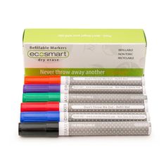 eight pens are lined up next to each other in front of a box on a white background