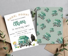 two cards and envelopes with an image of trucks on them, one is for the children's birthday party