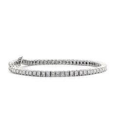 This diamond tennis bracelet has 5 carats of princess cut diamonds set in 14k white gold.  he diamonds are prong set vs the traditional bar which makes it sparkle and glitter.  Diamonds are G-H in color and SI clarity 7 inches in length. Can be made longer or shorter. Contact us. Classic Diamond White Tennis Bracelet With Baguette Diamonds, Princess Cut Diamond Bracelet For Wedding, Elegant Princess Cut Tennis Bracelet For Formal Occasions, Formal Cubic Zirconia Tennis Bracelet With Princess Cut, Diamond Cut Crystal Tennis Bracelet In Diamond White, Classic Princess Cut Diamond Bracelet For Formal Occasions, Elegant Princess Cut Tennis Bracelet For Anniversary, Classic Princess Cut Tennis Bracelet For Wedding, Luxury Princess Cut Tennis Bracelet For Wedding