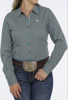 Cinch clothing is more than just pants and shirts, Cinch is an attitude of greatness. Cinch western wear is designed to protect you from the rough work you do all day. It speaks to a casual confident style that needs no explanation. This teal green with navy and orange geo print is no exception. The contrast cuffs give it extra flare. Long Sleeves Spread Collar Fitted Open Chest Pocket Button Down Front 100% Cotton Machine Washable Western Wear Women, Western Store, Confident Style, Ladies Shirt, Cowgirl Western, The Arena, Teal Orange, Kids Outerwear, Geo Print