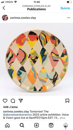 a ceramic plate with an abstract design on the front and bottom, in different colors