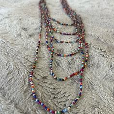 Nwot - Handmade Beautiful Layered Necklace 17” - 42” Length + 2” Extender Colorful Oval Beaded Jewelry For Festivals, Festival Jewelry With Colorful Oval Beads, Adjustable Multicolor Lariat Long Necklace, Multicolor Beaded Chain Necklace With Metal Beads, Handmade Multicolor Lariat Long Necklace, Faceted Beads Long Necklace For Beach, Multicolor Handmade Lariat Necklace, Handmade Multicolor Lariat Necklace, Bohemian Lariat Jewelry With Tiny Beads