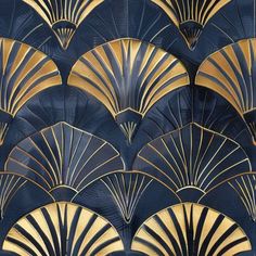 an art deco wallpaper with gold fan design on it's navy blue background