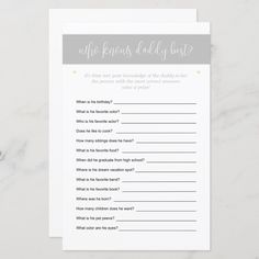 a gray and white baby shower game with question marks