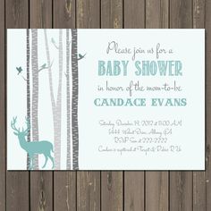 a baby shower is shown with deer and birch trees in the woods, on a wooden background