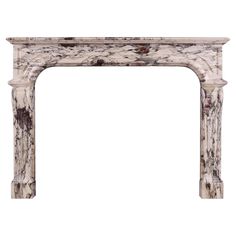 a white marble fireplace mantel with an intricate design