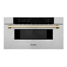 a stainless steel oven with gold trimmings on the front and bottom, is against a white background