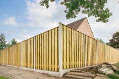 a wooden fence with steps leading up to it