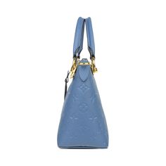 Louis Vuitton 'V Tote BB' handbag in blue monogram empriente leather with cream leather panels and gold hardware. Features double rolled handles and a removable shoulder strap. The bag has a two-way zip closure and blue suede lining wth two slip pockets. Includes dust bag. Brand = Louis Vuitton Condition = 8/10, Very good. light wear to corners, small mark on front of bag, fading to hardware. Dimensions = 10.5" x 4.25" x 7" Strap Drop = 21"-23" Material = Leather SKU = 13406-111 High-end Blue Satchel For Everyday Use, Luxury Blue Handheld Satchel, High-end Blue Satchel For Everyday, Luxury Blue Bag With Round Handle, Luxury Blue Bags With Round Handle, Luxury Blue Top Handle Satchel, Blue Monogram Canvas Shoulder Bag With Branded Hardware, Blue Top Handle Bags For Everyday Luxury, Luxury Blue Satchel With Handles