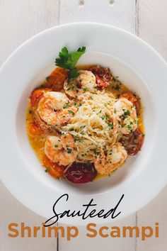 shrimp scampini in tomato sauce with parmesan cheese and parsley on top