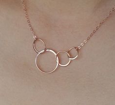 "Four eternal linked circles form the center of this beautiful necklace. The perfect 4 sisters or 4 best friends necklace/gift. Elegant. Simple. Available in silver, gold or rose gold. Overall length of all necklaces in photos is 16\". Choose the length for the necklace. These necklaces are adjustable. Your item comes in a cute gift box so you can give it as a gift - or enjoy opening it as a gift yourself! MATERIAL ------------------------------------------------- Silver: All in shiny solid ster Bridesmaids Jewelry Ideas, Rose Gold Bridesmaid Jewelry, Gold Bridesmaid Jewelry, Cat Necklace Gold, 4 Best Friends, 40th Birthday Gifts For Women, Interlocking Circle Necklace, Rose Gold Circle, Rose Gold Bridesmaid