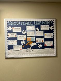 a bulletin board on the wall with snow place like home written on it and pictures