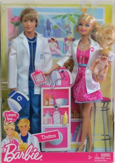 the barbie doll is holding two dolls in her arms and she has a doctor's outfit on