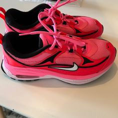 Brand New, Worn Once Around The House. Size 7.5, Bright Pink And Reds. Sporty Red Running Shoes For Spring, Red Running Shoes With Round Toe For Spring, Red Running Shoes For Spring, Spring Red Running Shoes, Nike Red Spring Sneakers, Nike Red Sneakers For Spring, Red Nike Sneakers For Spring, Red Sneakers With Vented Sides For Sports, Nike Pink