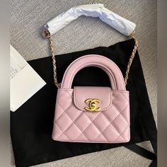 Chanel Micro Shopping Bag In The Color Rose New In Box. The Color Is A Muted Pink With A Purple Undertone. Slg Size, Does Not Fit A Phone. Bag Is 100% Authentic. Comes With Box, Dust Bag, Ribbon And Receipt. No Returns Or Exchanges, All Sales Are Final. Evening Double Handle Box Bag With Original Box, High-end Box Bag With Handles As Gift, Handheld Shoulder Bag With Original Box As Gift, High-end Pink Box Bag With Top Handle, High-end Pink Top Handle Box Bag, High-end Pink Rectangular Bag, High-end Pink Handheld Bag, High-end Pink Shoulder Bag With Top Handle, High-end Pink Top Handle Shoulder Bag