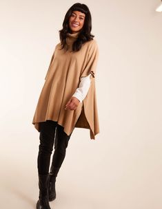 Here is a simple and cosy layer to wear this AW, that can be teamed with just about any outfit of your choice! This poncho is not your usual layering piece! Why not try something new this season, and be sure to not regret it! 50% Viscose, 28% Polyester, 22% Nylon Made in China Machine washable Roll neckLong sleeveButton up sidesThis item is a ONE size that fits UK 8-16Model wears One SizeModel height: 175cm/ 5ft 9 Try Something New, Layering Pieces, One Color, Something New, Camel, Layering, High Neck, Vanilla, China