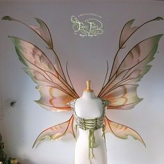 a mannequin dressed as a fairy with wings