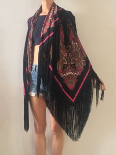 Gorgeous 1970s silk fringe maxi scarf. Perfect boho style worn with whatever you like! Shake your fringe!Add a pop of color pairing it with a black jacket. Wonderful soft silk with a dramatic black and hot pink floral paisley pattern. Hot pink, green, grey, white and black - super ornate and baroque paisley. Black rayon fringe border. Signature on the scarf is illegible. 100% silk. Please dry clean only. Very good vintage condition with no fabric or sewing flaws. Measurements116cm by 116cm/ 45 b Bohemian Scarves With Tassels For Spring, Spring Multicolor Fringe Shawl, Multicolor Fringe Shawl For Spring, Black Bohemian Shawl For Fall, Spring Multicolor Shawl With Fringe, Summer Bohemian Black Shawl, Bohemian Black Shawl For Summer, Black Bohemian Shawl For Spring, Spring Bohemian Shawl Scarf