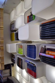 the shelves are filled with many different types of books