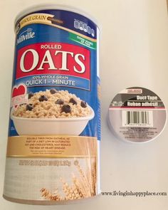 a can of oats next to a container of cereal