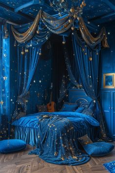 a bedroom with blue walls and gold stars on the ceiling, along with an elaborate canopy bed