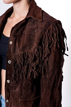 The Vintage Brown Cowboy Fringe Suede Jacket Distressed Brown Long Sleeve Outerwear For Fall, Distressed Brown Long Sleeve Leather Jacket For Fall, Distressed Brown Leather Jacket For Fall, Brown Tassel Jacket, Cowboy Fringe, Vintage Winter Outerwear With Fringe, Vintage Fitted Outerwear With Fringe, Brown Leather Jacket With Fringe, Vintage Brown Fringed Outerwear