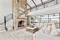 a living room with couches and a fire place