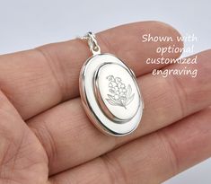 An unique stacked double oval sterling silver locket with 4 photo slots: 1. A smaller locket (17 x 11 mm) sitting on a larger oval (24.5 x 18 mm) locket, weighing 7.4 grams. Both sides are plain and highly polished to be engraved with initials, monograms, texts or simple graphics (limited to black/white, line drawing type). 2. Four photo slots are available: two photos can be inserted into bottom/main chamber; two smaller ones can be put inside the upper, smaller chamber. Photo insertion service Sterling Silver Locket, Oval Locket, Silver Locket, Silver Lockets, 4 Photos, Locket Necklace, Message Card, Custom Engraving, Locket