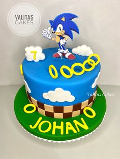 a birthday cake with sonic the hedgehog on top