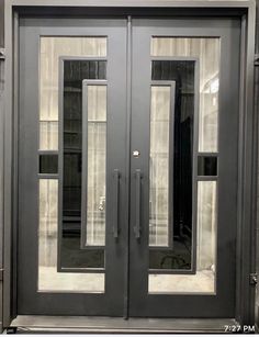 the double doors are open and ready to be used for an office or commercial building