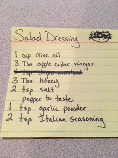 a piece of paper with writing on it that says salad dressing 1 cup olive oil 3 tips apple cider vinegar