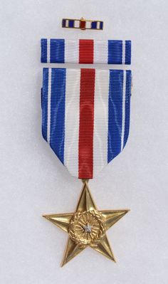 an award medal with a star on it