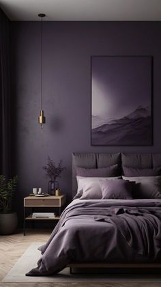 a bedroom with purple walls and bedding in the corner, along with a painting on the wall