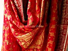 Express shipping! A very beautiful red colour Sada Saubhagyawati Bhava rich Banarsi Ghatchola silk golden zari woven dupatta. This dupatta also has Bandhani hand tie dye design. It can be used for wedding dupatta, Odhani, with festival outfits, Lehenga dupatta, it is a multipurpose dupatta which goes with most of the things and occassions. It can also be used to gift to someone. This is a zari woven dupatta with full length there is no print on it. Dimension: Length: 2.5 meter Width: 1.04 meter Red Jamawar Sharara With Zari Work, Unstitched Red Sharara With Dupatta, Red Anarkali Traditional Wear With Dupatta, Red Lehenga With Traditional Drape And Dupatta, Red Lehenga With Dupatta In Traditional Drape, Red Anarkali Set With Dupatta For Traditional Ceremonies, Red Anarkali Set With Zari Work In Jamawar, Red Anarkali Set With Pallu In Traditional Drape, Red Anarkali Set With Zari Work On Jamawar