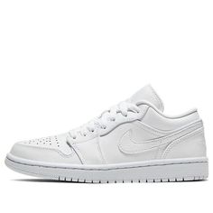 This Air Jordan 1 Low "Triple White" is built completely from smooth leather and has three hits of tonal branding – a Jumpman on the tongue, a Swoosh on the sidewall, and a Wings logo on the heel. Overlays are crafted with textural tumbling all across, even along with the swoosh. Jordan 1 Low Triple White, Air Jordan 1 Low White, Wmns Air Jordan 1, Vapour Max Nike, Jordan Low, Nike Sacai, White Basketball Shoes, Low Air Jordan 1, Womens Air Jordans