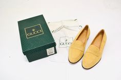 Amazing Vintage Leather penny loafers by Gucci * Super soft mustard/tan sueded leather upper  * tan leather interior lining * Fringe back zipper pull  * Wooden stack heel  * Leather sole By Gucci with original box from the 80s Made in Italy Size 39 fits like a US 7 1/2-8 (I'm a size 8 1/2 and they are tight on me) Please see measurements below to ensure best fit: Toe box 3" Insole length 9 3/4" * Sizes can vary from antique to vintage, vintage to modern and brand to brand. In order to ensure bes Gucci Tan Loafers, Timeless Gucci Slip-on Loafers, Gucci Slip-on Loafers With Round Toe, Yellow Suede Slip-on Loafers, Brown Gucci Slip-on Loafers, Penny Loafer, Gucci Shoes, Penny Loafers, Loafers For Women